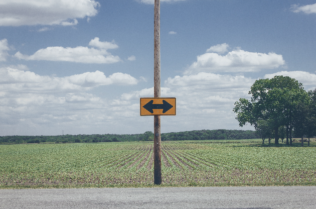 sign in the road to go left or right